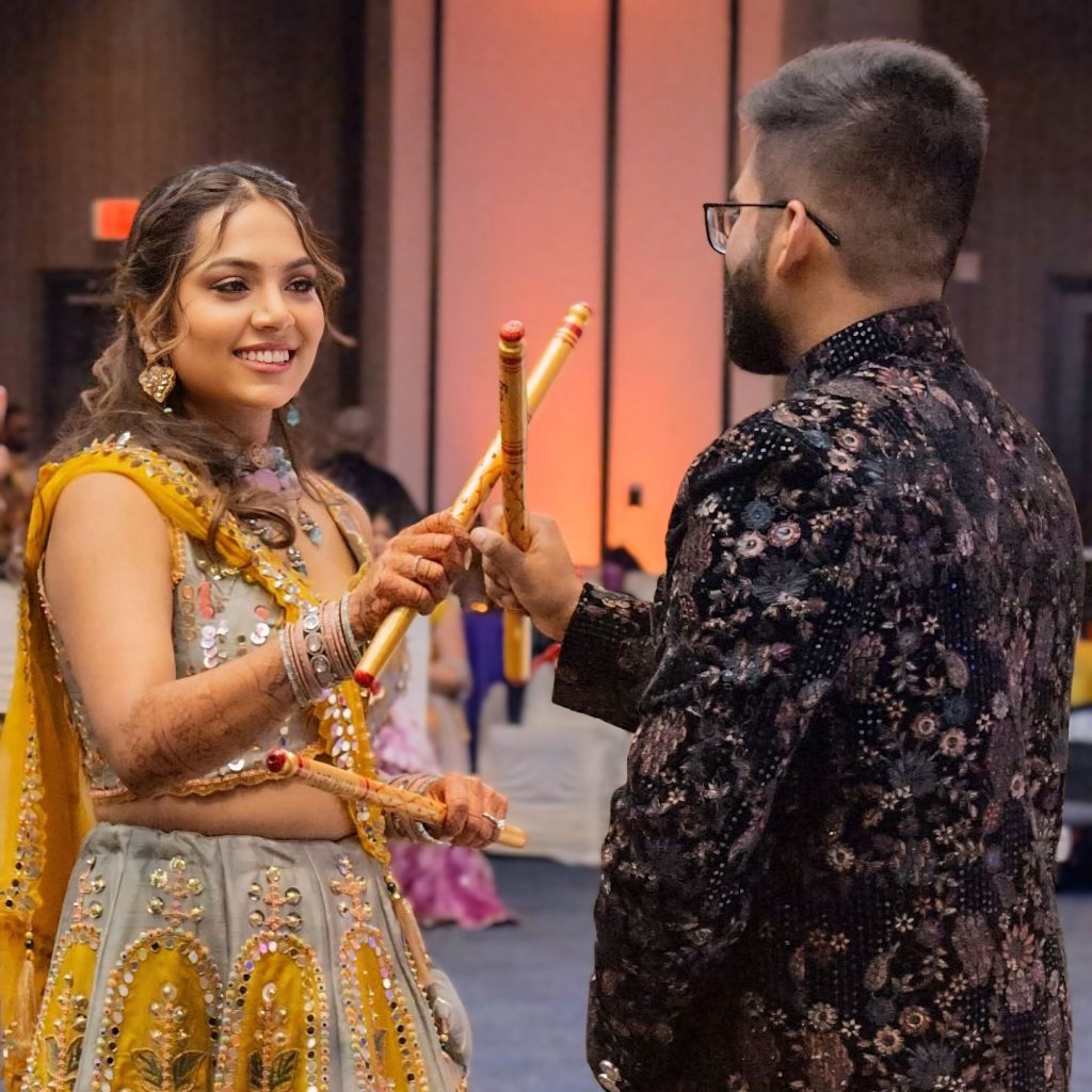 Couple dancing during a colorful celebration